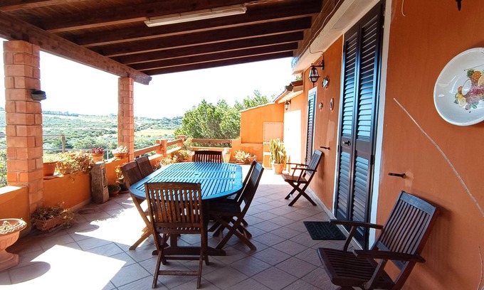 Sant'Antioco House | Holiday Home 'Belo Horizonte, near the sea' with Private Terrace and Wi-Fi