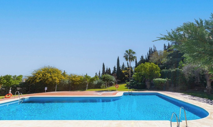 Torrequebrada House | Holiday Home 'Casa Buda ' with Shared Pool, Wi-Fi and Air Conditioning