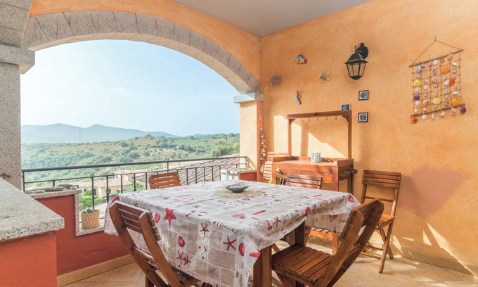 San Teodoro House | Holiday Home “Home Residence Barbara” with Garden & Balcony