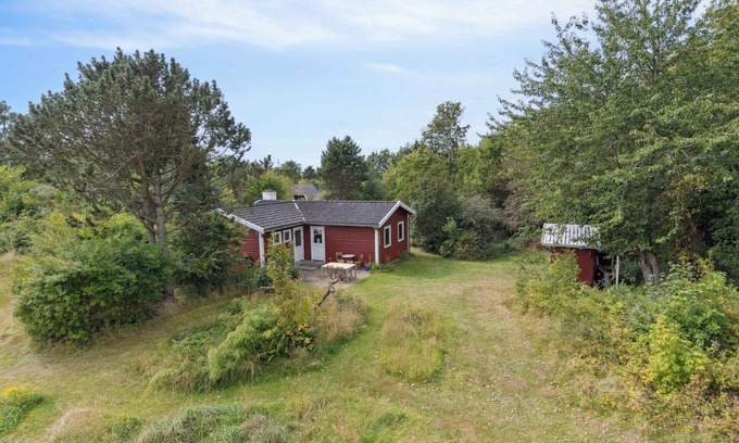 Faarevejle House | Holiday home on adventurous plot near beach