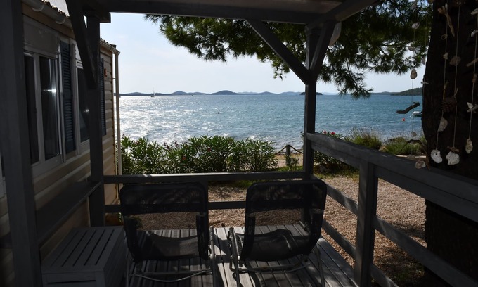 Pirovac House | Holiday house/mobile home in the 1. Line seafront, 34 m² + 24 m² terrace