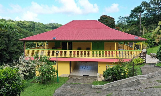 Gros-Morne House | Homerez - Charming House in Gros-Morne with Terrace and Garden