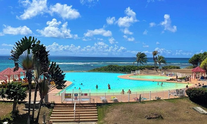 Anse des Rochers Apartment | Homerez - Studio in Saint-François with pool