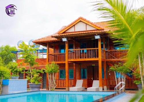 Ham Tan Hotel | Homestay Bằng Lăng Tím - Bình Thuận