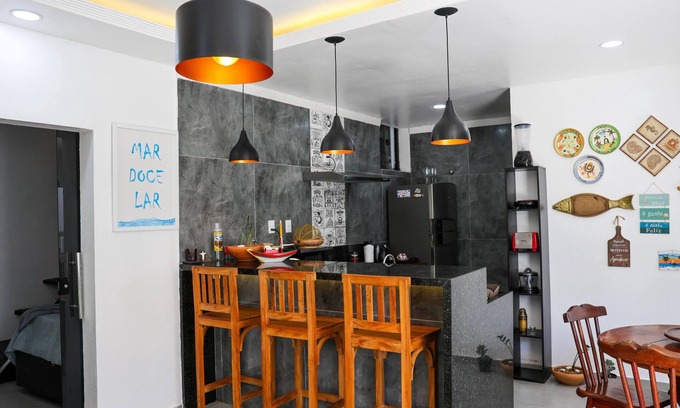 Praia Grande House | House in Praia Dos Anjos, 250m from the beach with air conditioning