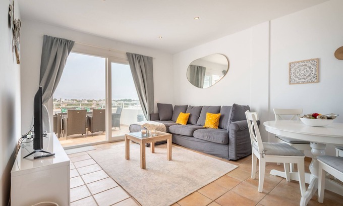 Cala d'Or Apartment | House Liv 'El Puerto I 3-11 ' with Shared Pool, Wi-Fi and Air Conditioning