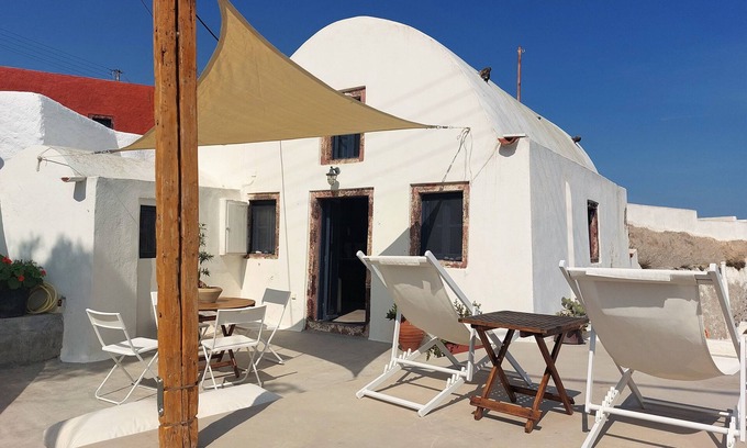 Finikia House | House of the Seven Ships. Cycladic traditional house with sea and sunset view
