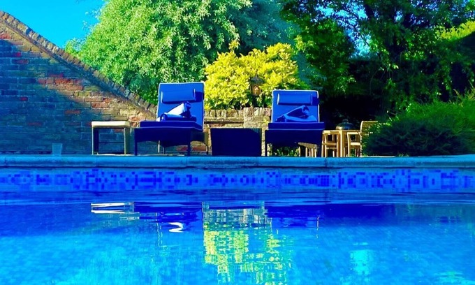 Twywell Cottage | Idyllic Country Retreat with Wow Views & Lush Pool