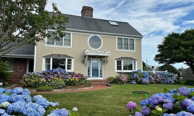 West Yarmouth House | Immaculate Waterfront Beach House by RedAwning