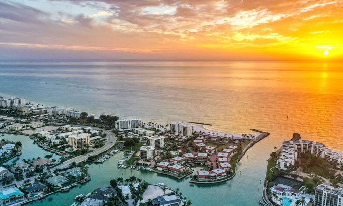 Coquina Sands Condo | Impeccable Condo Across from the Moorings Private Beach plus Private Boat Dock