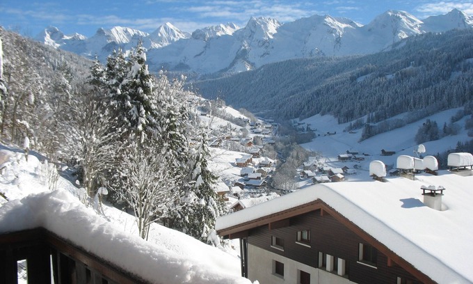 Le Grand-Bornand Apartment | Individual chalet facing the Aravis, south garden level with terrace and lawn