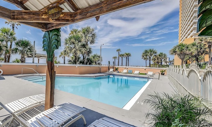 Panama City Beach Hotel | Indulge in Home Like Comfort! Beachfront Property, Pets Allowed, Free Parking