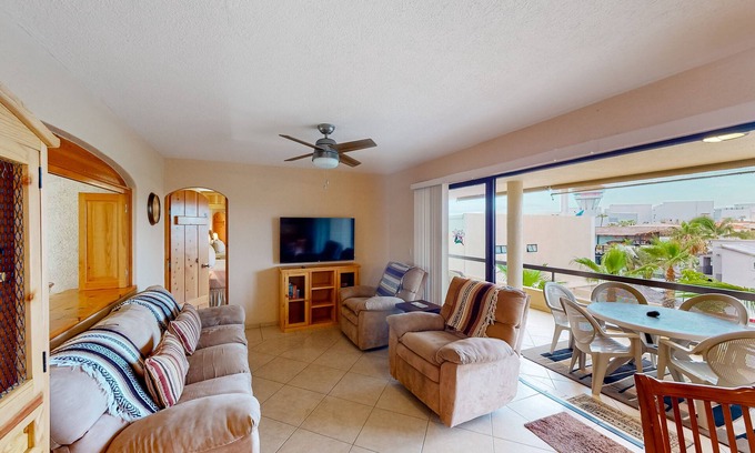 Zona Hotelera Apartment | Inviting apartment across from the beach with pool, grill, balcony & golf nearby
