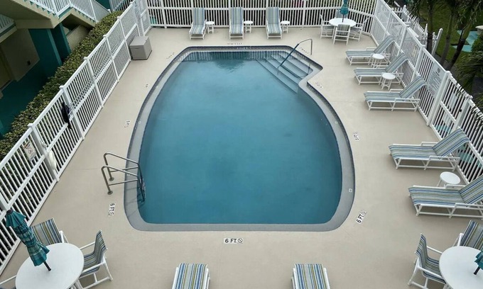 Melbourne Beach Apartment | Inviting Room with Balcony - Steps from Indialantic Beach