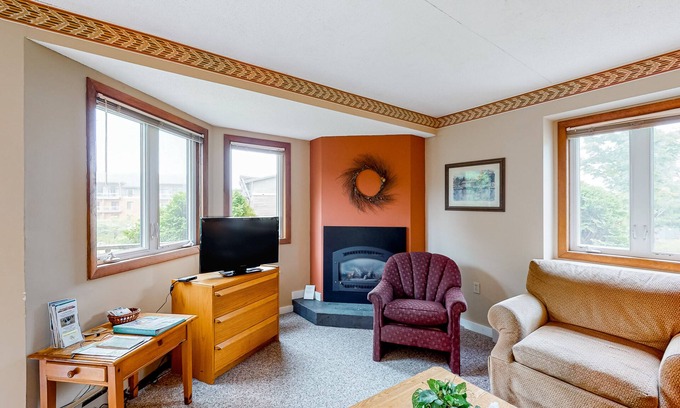 North Troy Condo | Inviting ski-in/out condo with mountain view, fireplace, deck & washer/dryer