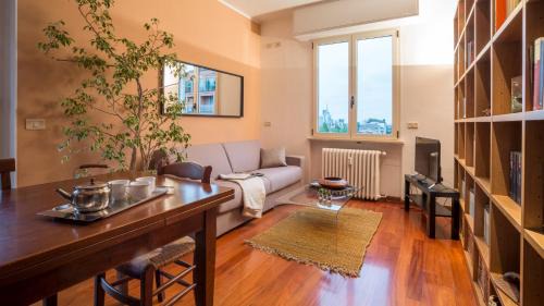 Ghisolfa Apartment | JOIVY Warm Family Flat for 6 with Terrace in Milan