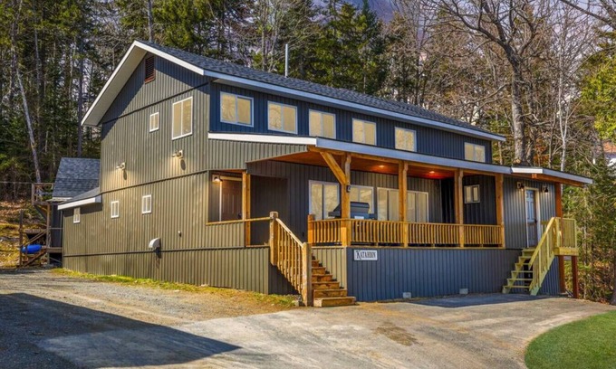 Northeast Somerset Cabin | Katahdin - Cabin 4 · Lawrence`s Lakeside Cabins | `Katahdin`: Boat Dock + Kayaks
