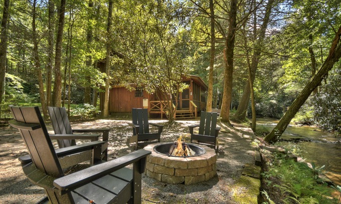 Ellijay Cabin | Keeping it Reel -Your pet-friendly creekfront haven, complete with hot tub, firepit, pool table, WiFi, and superb fishing
