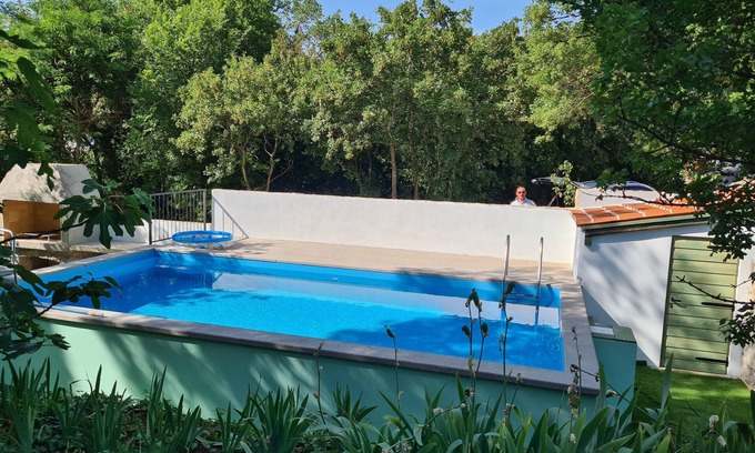 Municipality of Omisalj House | Kids friendly house with large private, fenced garden, pool, 1km beach