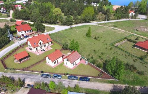 Kruklanki Apartment | Komfortowe domki letniskowe nad jeziorem na Mazurach 2
