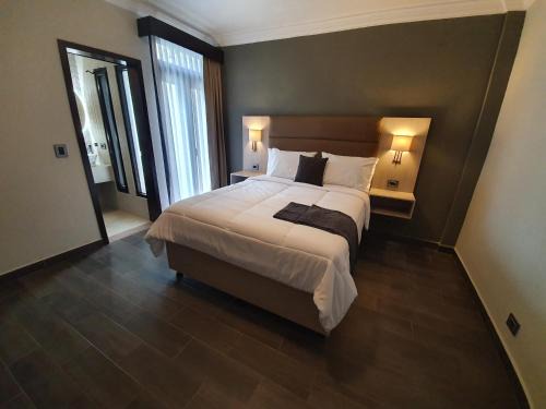 Zona 13 Hotel | L'Aurora Inn