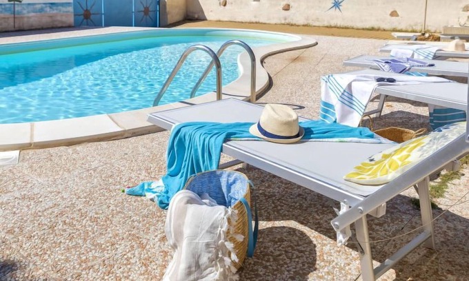 Trinita d'Agultu Apartment | L'Oasi Trilo A3 by Interhome