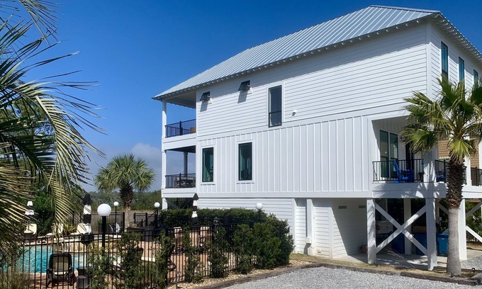 Gulf Shores House | “Lagoonfront Privacy at its Best: Heated Pool, Hot Tub, & Kayaks Included”