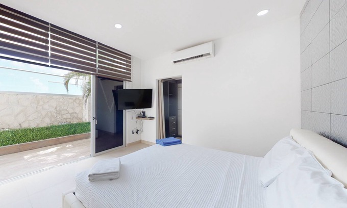 Downtown Cancun Apartment | Lakefront apartment with pool, fitness room, washer/dryer, & patio