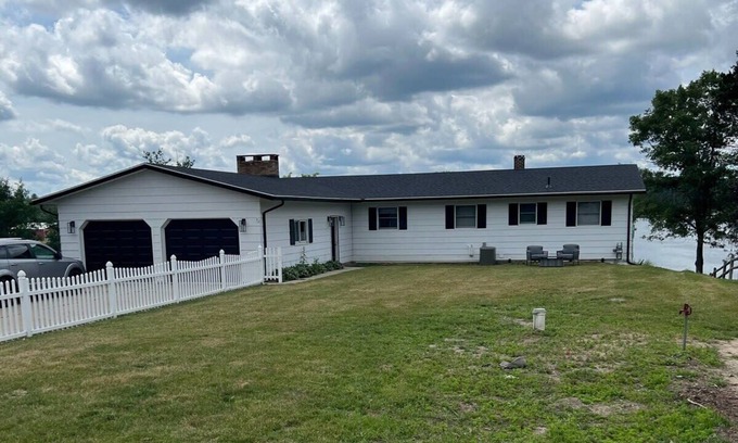 Cadillac House | Lakefront cottage with hot tub