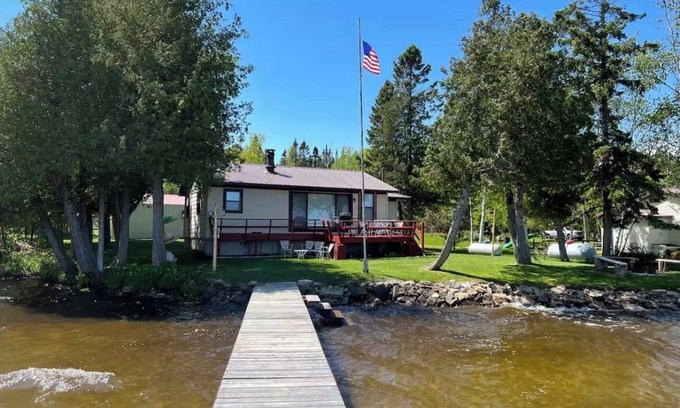 Manistique Cottage | Lakefront getaway on Indian Lake with private dock