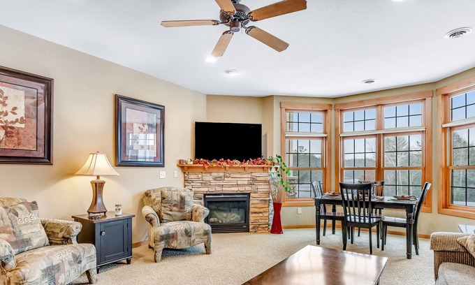 Three Lakes Condo | Lakefront ground-floor condo with balcony, fireplace, W/D, pool & hot tubs