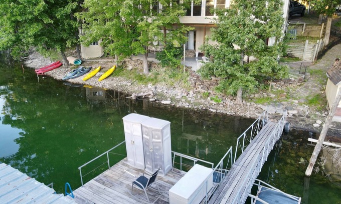 Lost Bridge Village House | Lakefront home on the water, private cove & hot tub on Beaver Lake, Garfield, AR