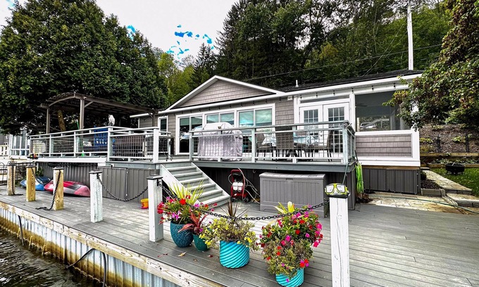 De Ruyter Cottage | Lakefront home with private dock, lake views, kayaks, grill, large covered deck