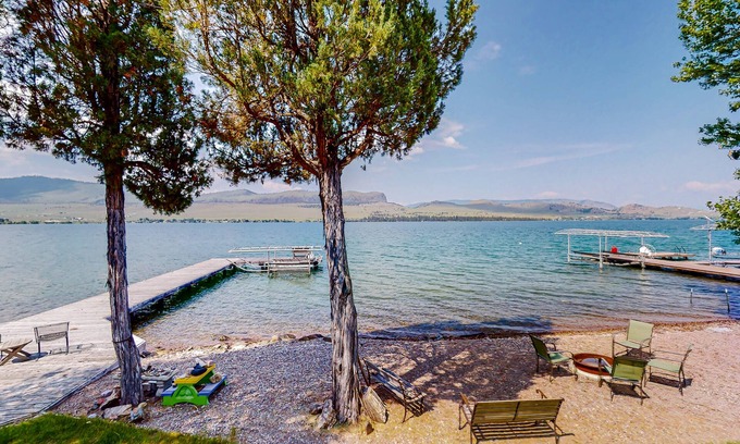 Big Arm House | Lakefront home with private beach, dock, firepit, & grill - dazzling sunset view