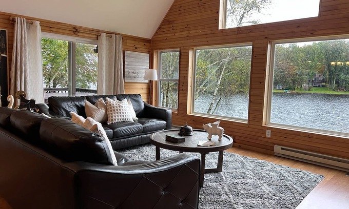 Pocono Lake House | Lakefront - Hot Tub, AC, 7 Paddleboards, Canoe, Kayak, Golf Car, Fire Pit, Boat
