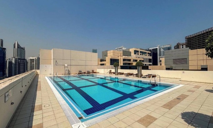 Madinat Zayed Apartment | Large Modern 1-Bedroom in Bay Square 9