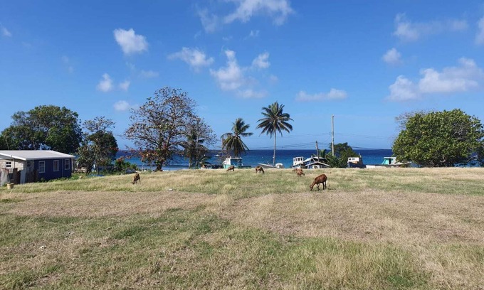 Six Mens Cottage | Less than 5 minutes walk to the sea. KORE is a charming 2-bedroom chattel house.