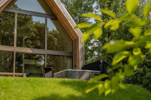 Zolder House | Lodge met Jacuzzi - 4 personen - Woodz Lodges