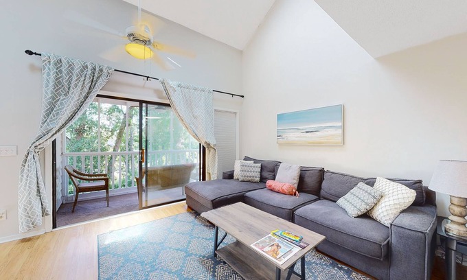 Little River Condo | Loft condo near beach & golf with covered porch, tennis, balcony, & grill