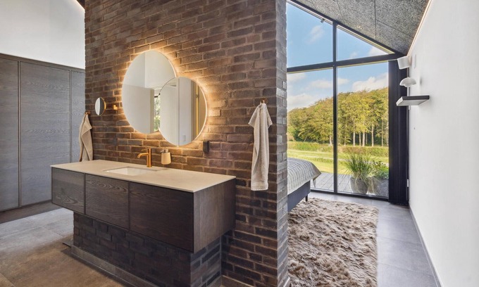 Hejlsminde Strand House | Look forward to a beautiful sea view in this attractive vacation home with outdoor wellness.
