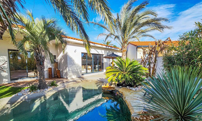 Roujan House | Look forward to an unforgettable vacation in this modern vacation home with pool.