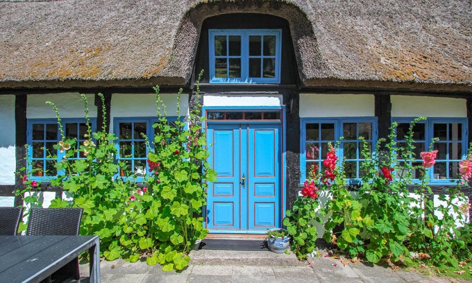 Samsø House | Look forward to an unforgettable family vacation in this thatched cottage.
