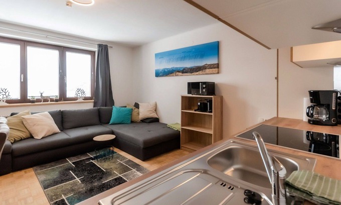 Taxenbach Apartment | Lovely apartment for 4 guests with WIFI, TV, balcony and panoramic view
