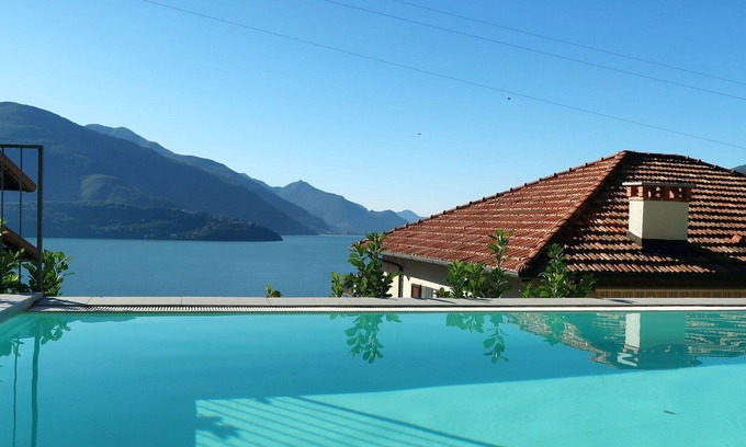 Consiglio di Rumo Apartment | Lovely apartment for 4 people with WIFI, A/C, pool, TV, balcony and pets allowed