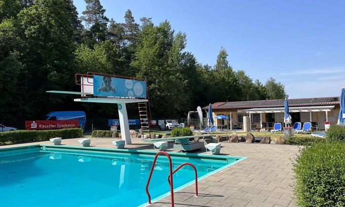 Bad Emstal House | Lovely apartment in villa for 3 people with pool, WIFI, TV, terrace and pets allowed