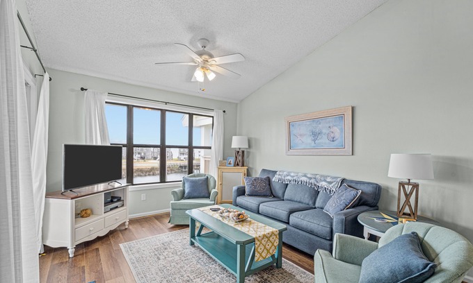 Avon Condo | Lovely canal front condo with pool, kitchen, washer/dryer, TV, & board games