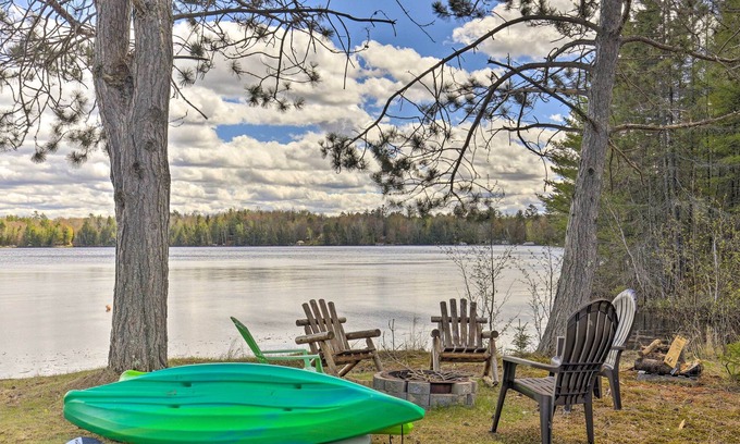 Eagle River Cottage | Lovely Lakefront Cottage w/ Fire Pit & Yard!