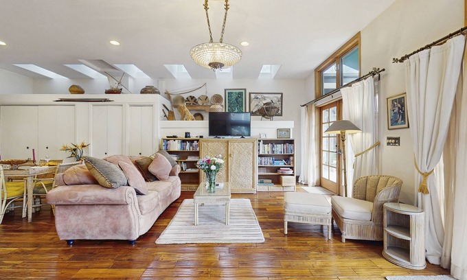 Woody Creek House | Lush tropical villa with garden paths, river views, and high-end comfort