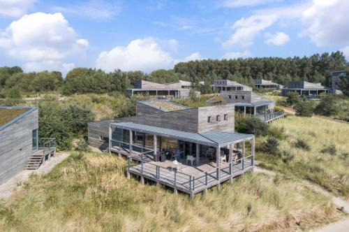 Ouddorp Villa | Luxe Strandvilla - 4p - 50m van het Zandstrand - Villa 48