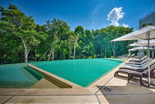 Akumal Apartment | Luxe Tao Riviera Resort Condo with Beach and Golfing!
